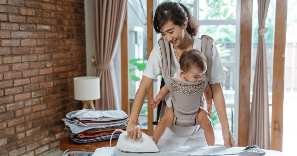 the best baby carriers for petite moms allow hands to be free to get things done.